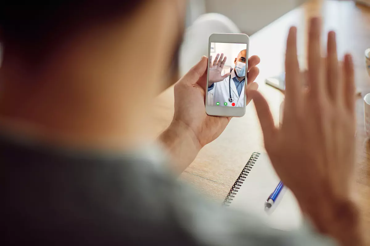 Doctor Greeting Patient Video Call